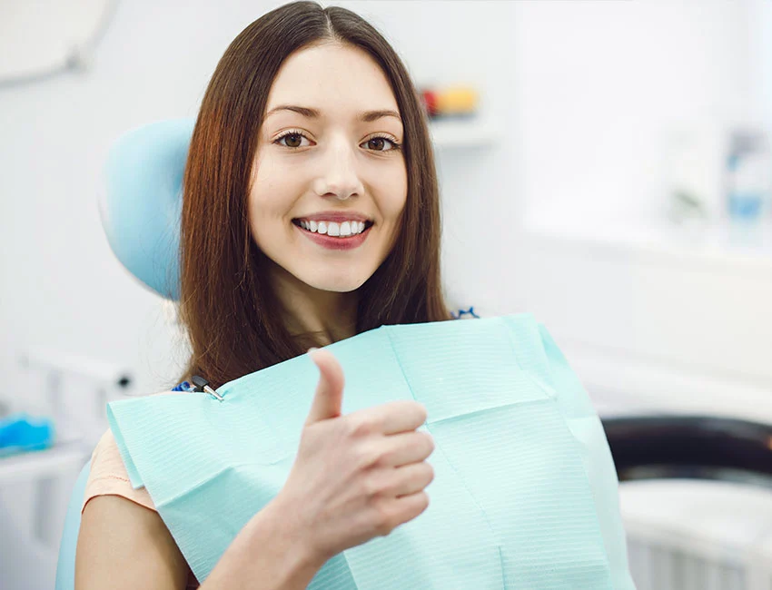 Happy patient after dental emergency