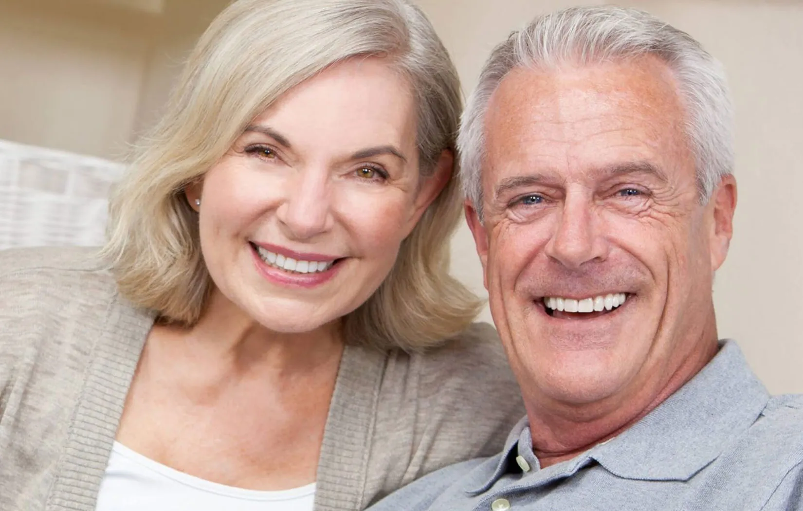 Senior couple happy with dental implants