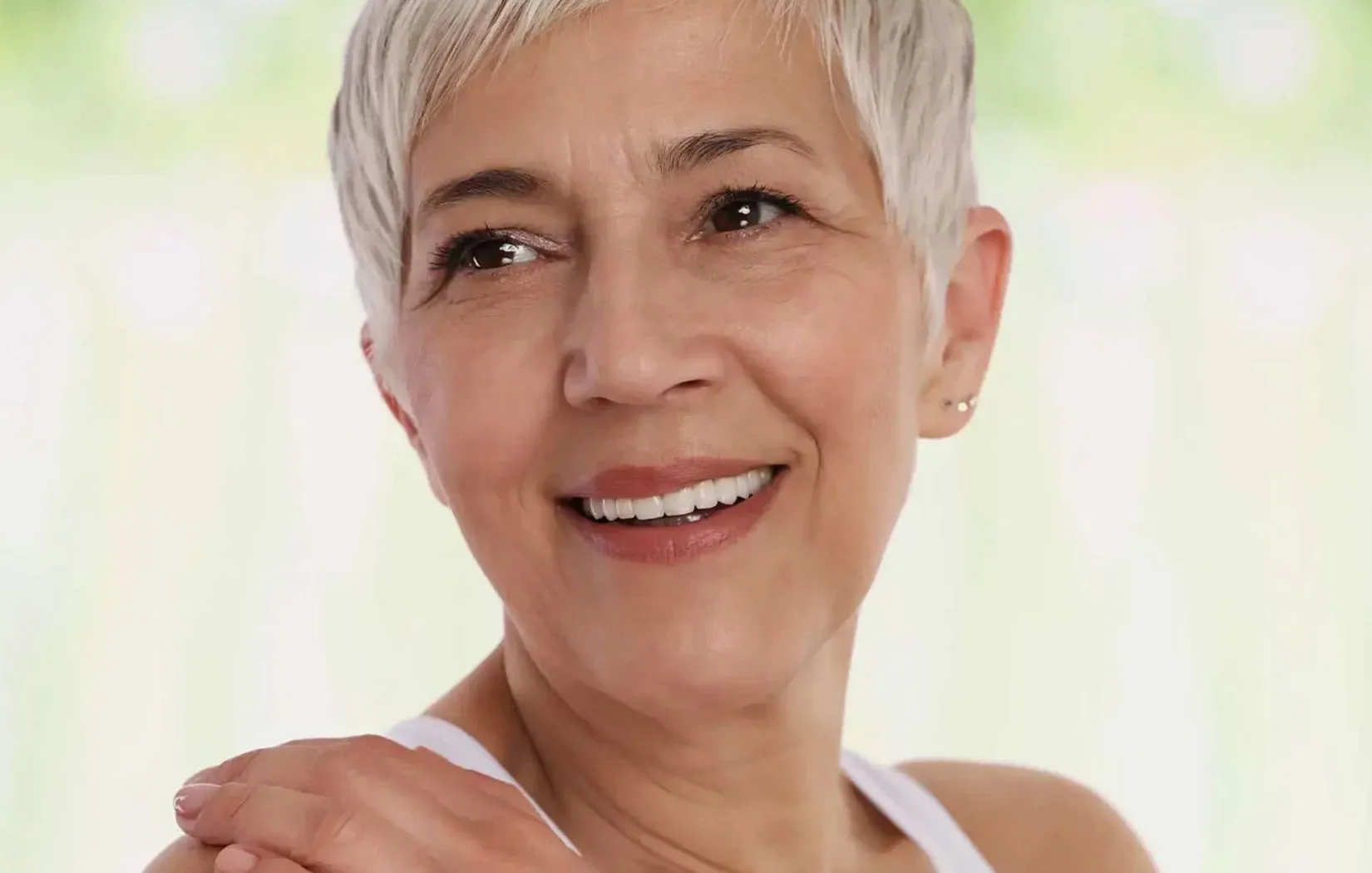 Female smiling with dental implants