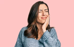 Female with tooth pain