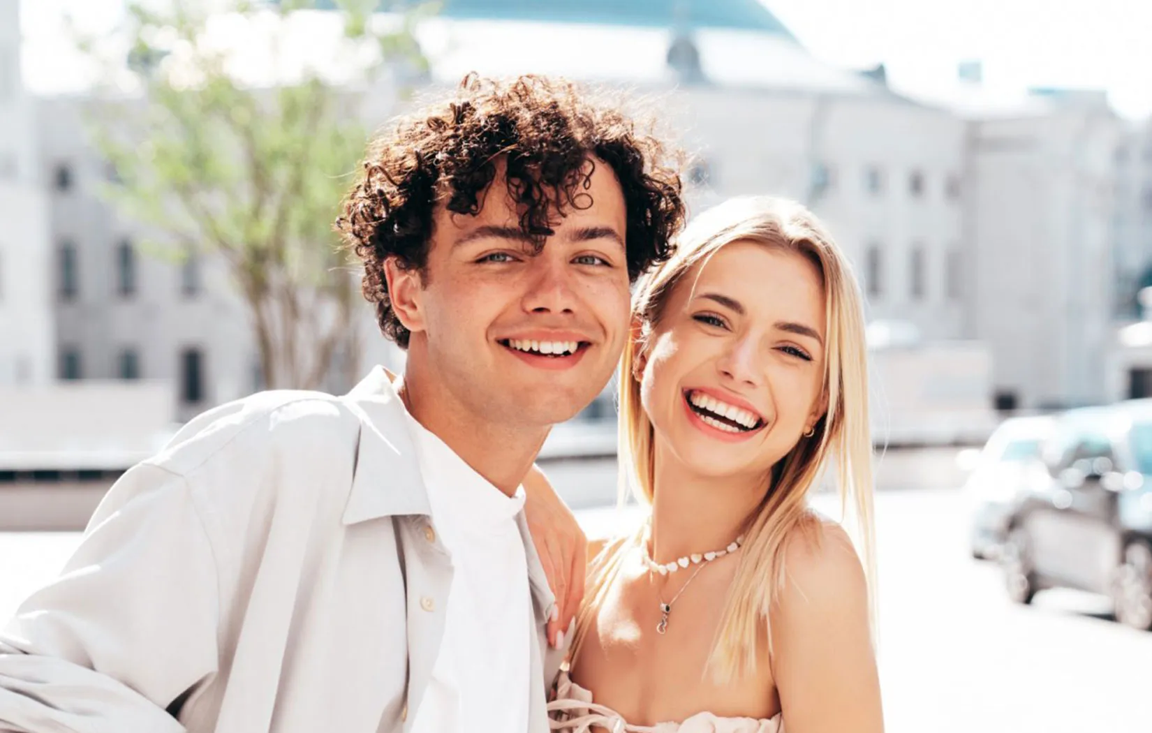 Couple smiling with healthy gums and teeth