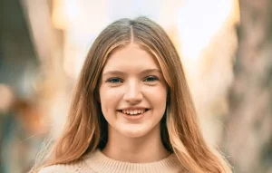 Girl healthy smile after dental checkup