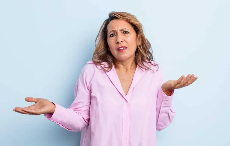 Female patient has to make a decision between All-on-4 dental implants and dentures