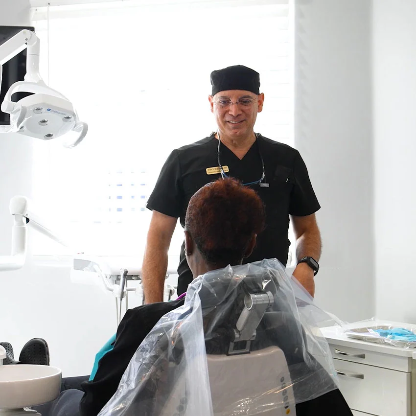 Dr. Arment and patient at Gardena Dental Group